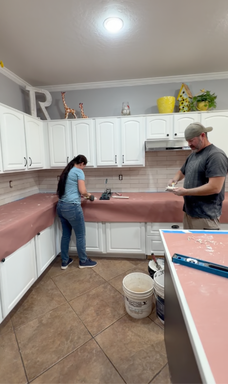 Laura and Travis at the tile backsplash